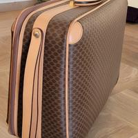 Valigia vintage con rotelle