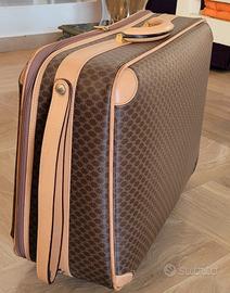 Valigia vintage con rotelle