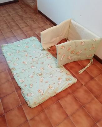 Paracolpi e piumone per lettino