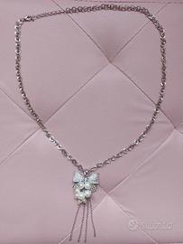 Collana a forma di fiocco con glitter e perle