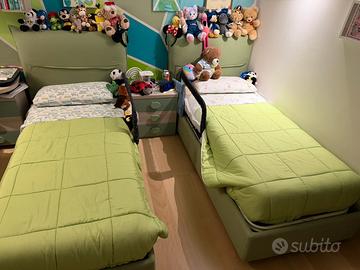 Coppia di letti singoli con cassone, imbottiti