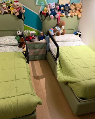 Coppia di letti singoli con cassone, imbottiti