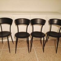 4 sedie in pelle e metallo.
