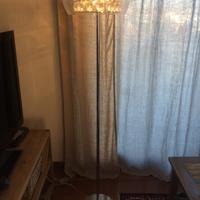 Piantana moderna in acciaio drimmerabile