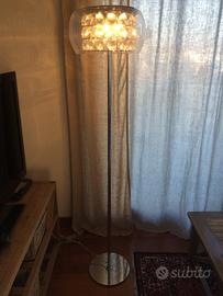 Piantana moderna in acciaio drimmerabile