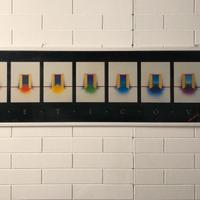 POSTER INCORNICIATO "SEVEN DOORS" 103,5X33CM.