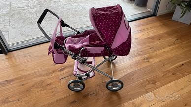 Carrozzina giocattolo Bambina