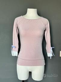 Maglia rosa con maniche plissettate