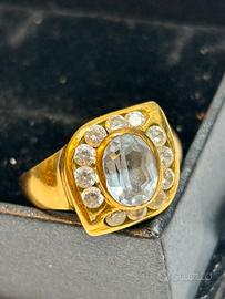 Anello in oro giallo, acquamarina e diamantini