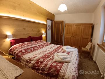 Bilocale piano terra Dimaro con posto auto esterno