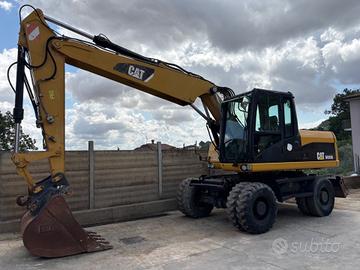 Escavatore gommato CAT M315D
