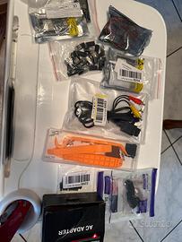 Oggetti elettrici, circuiti, cavi, adattatori