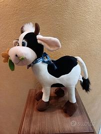 mucca con margherita 