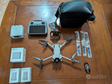 DJI Mini 4 pro + RC2 + 5 batterie + 2 Hub