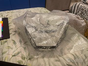 Griglia protezione fari moto