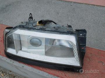 Coppia di fari anteriori originali usati alfa 164