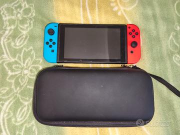 Nintendo switch + case con accessori