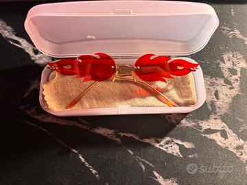 Due paia di occhiali da sole