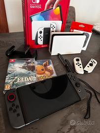 Nintendo Switch OLED + 2 Giochi + 4 Joy-Con