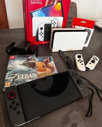 Nintendo Switch OLED + 2 Giochi + 4 Joy-Con