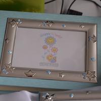 Album fotografico e cornice bambini in argento