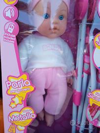 Bambolotto con passeggino 