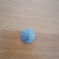 100 lire piccola con i 9 chiuse