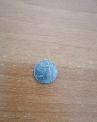 100 lire piccola con i 9 chiuse
