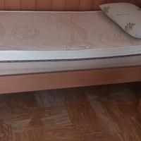 Camera letto in legno massello