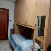 Armadio a ponte con letto