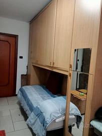 Armadio a ponte con letto