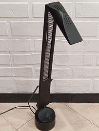 Lampada a braccio oscillante