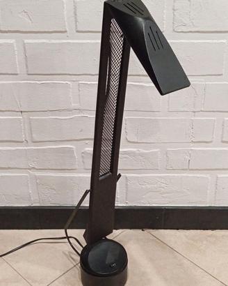 Lampada a braccio oscillante
