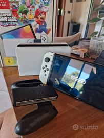nintendo switch oled + pokemon scudo + custodia 