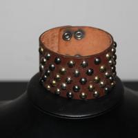 Bracciale pelle marrone borchie