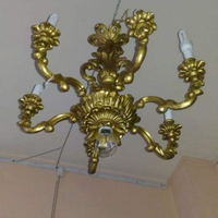 Lampadario in legno dorato
