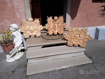 Scultura rosoni in legno realizzati a mano