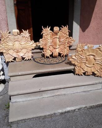 Scultura rosoni in legno realizzati a mano