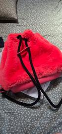 O Bag originale rosa fluo con rivestimento pellicc