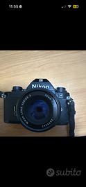 Nikon EM e dall'obiettivo Nikon Lens Series E 50