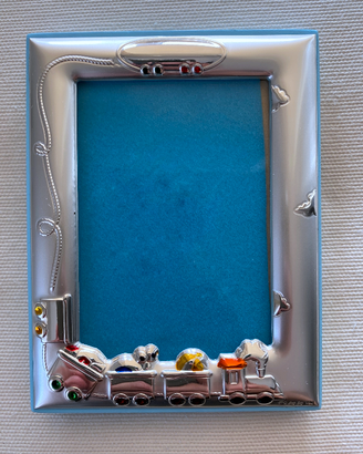 Cornice bimbo in argento