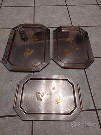 Vassoi acciaio decorati