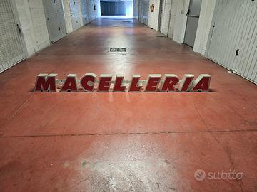 insegna luminosa "MACELLERIA"