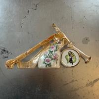 Cornamusa decorativa in ceramica