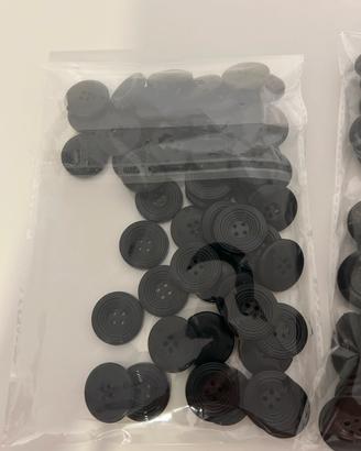 bottoni neri assortiti per cucito e sartoria