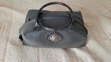 valigia baule vintage con manici verde petrolio