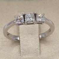 ANELLO TRILOGY IN ORO 18kt. CON DIAMANTI PRINCESS