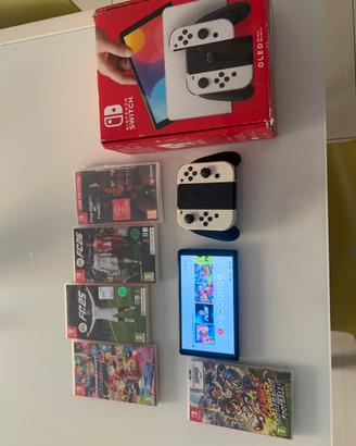 Nintendo switch oled con 5 giochi