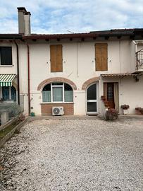 Casa a schiera con giardino privato