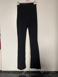 Pantaloni flare aderenti neri